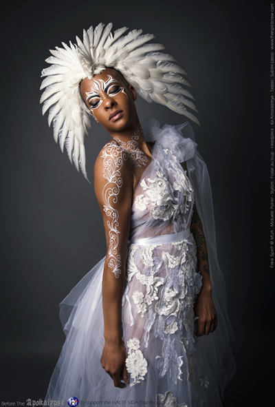 headpiece feathers valkyrie tattoo body painting white